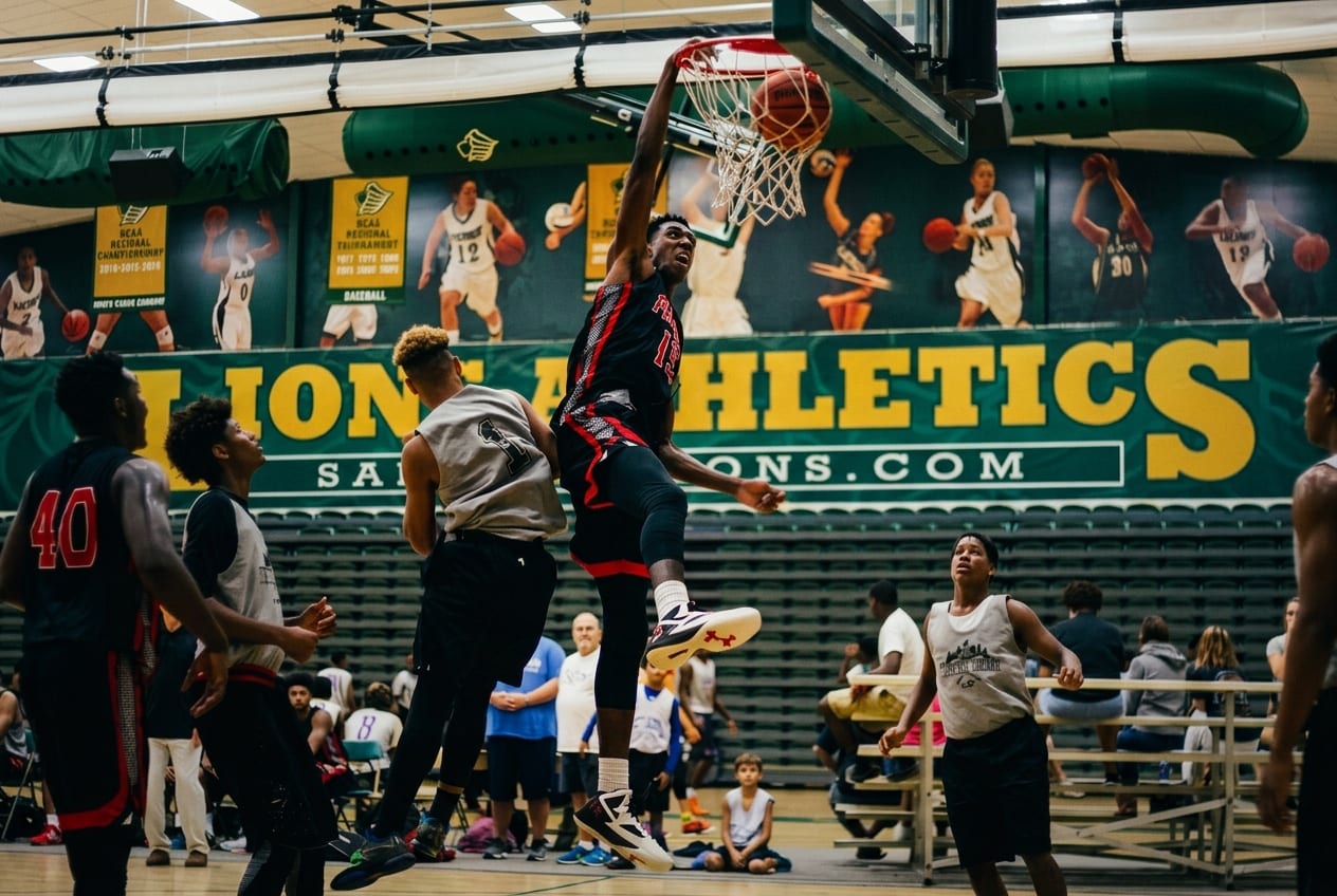 Player rising for a dunk above the rim