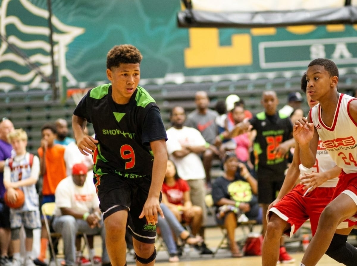 Showout All-Star handling against a defender