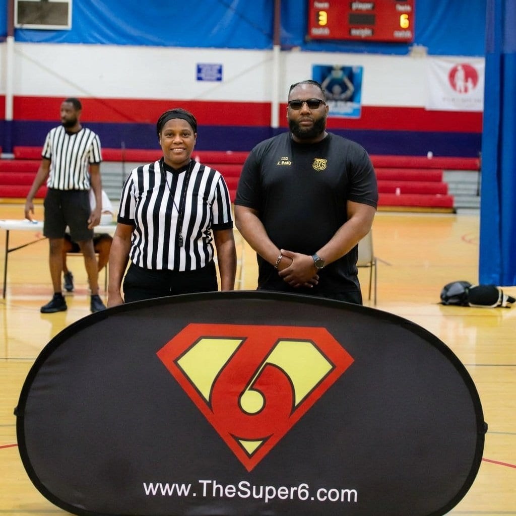 Referee and coach in conversation