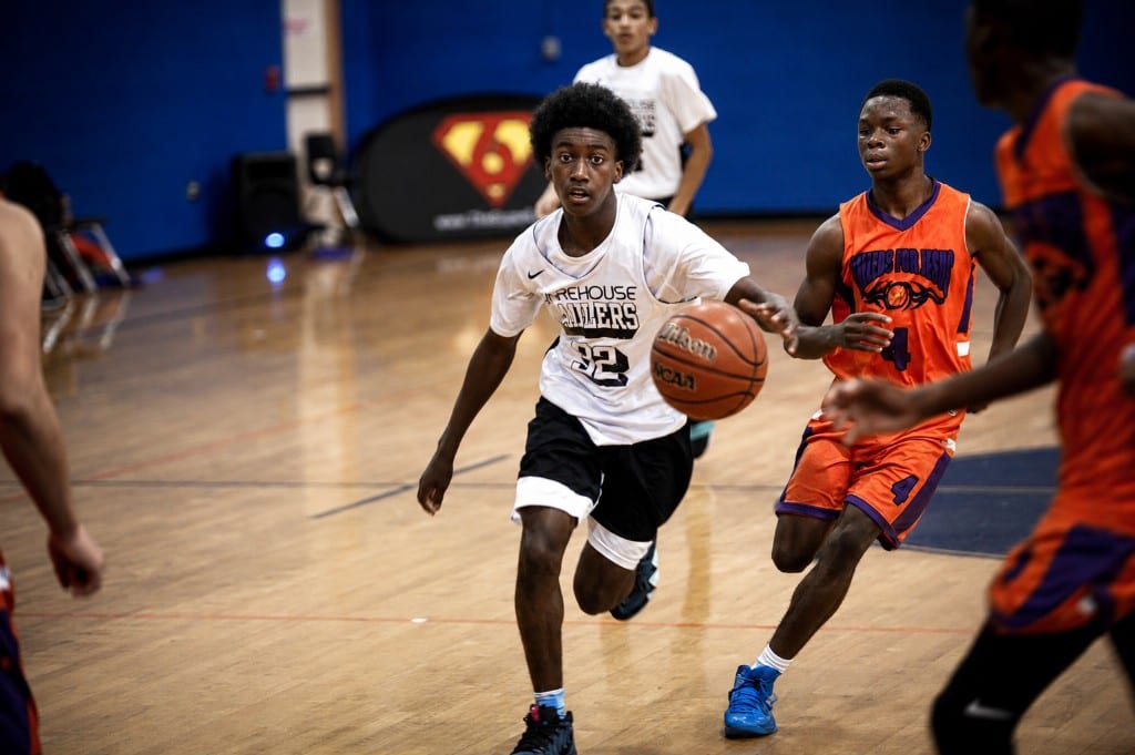 Firehouse Cavaliers player driving to the basket at Super6 Series LLC