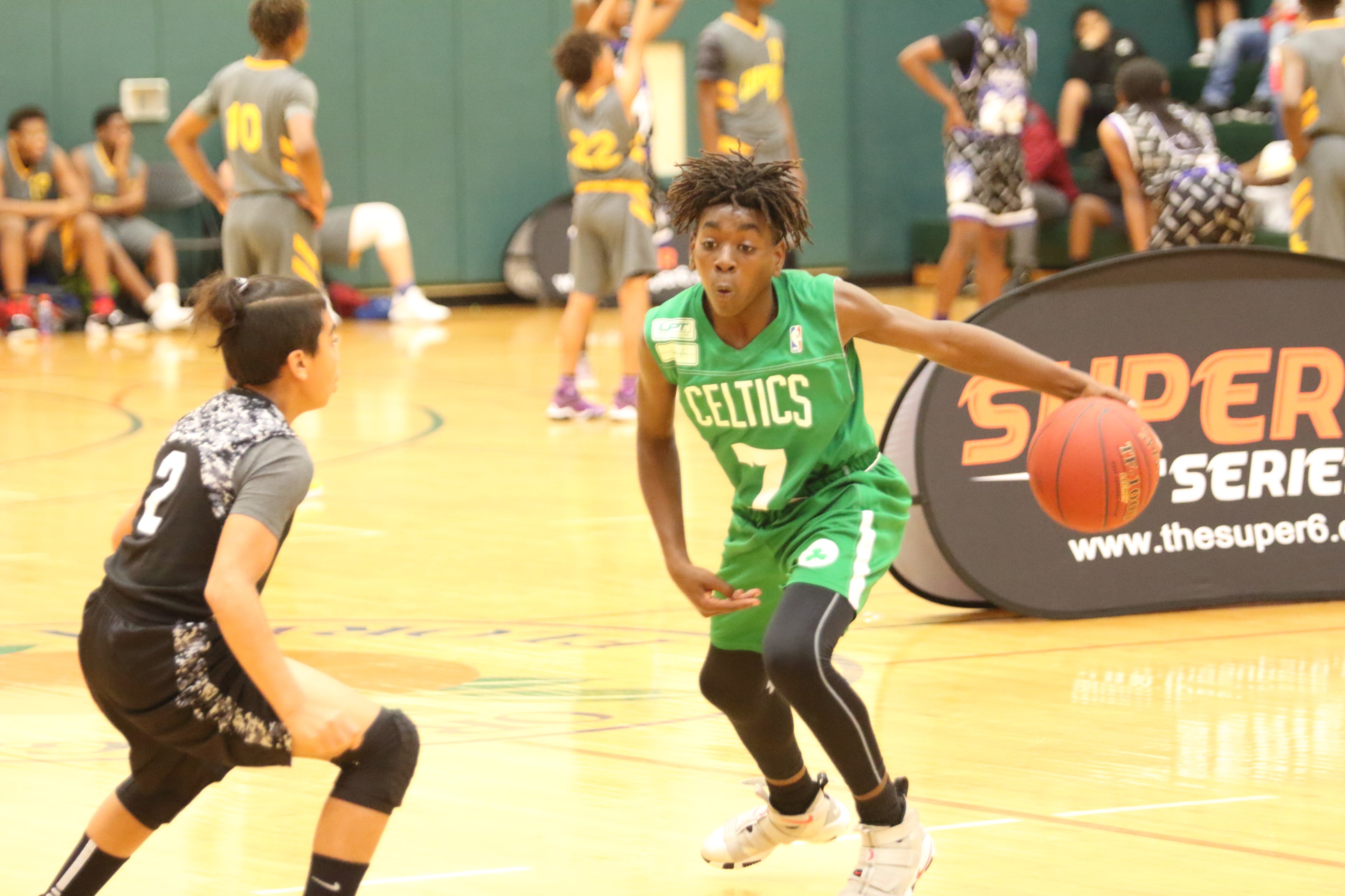 Crowd erupting in celebration during a Super6 game